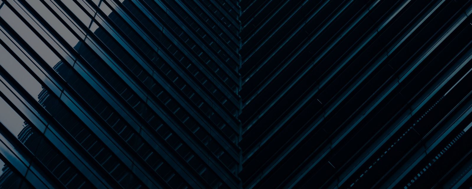 Abstract architectural pattern with diagonal glass and steel lines forming a chevron design - Neutrinos