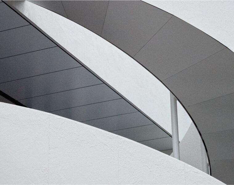 Minimalist architectural curves symbolizing innovation and digital fluidity – Neutrinos