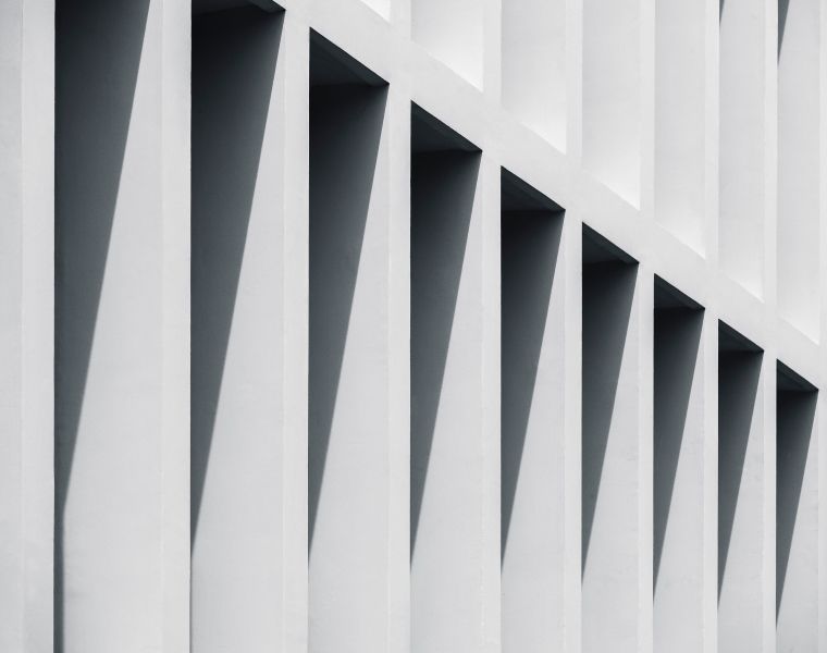 Modern white architectural wall with geometric shadows-Neutrinos